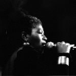 Photograph of Elouise Burrell singing